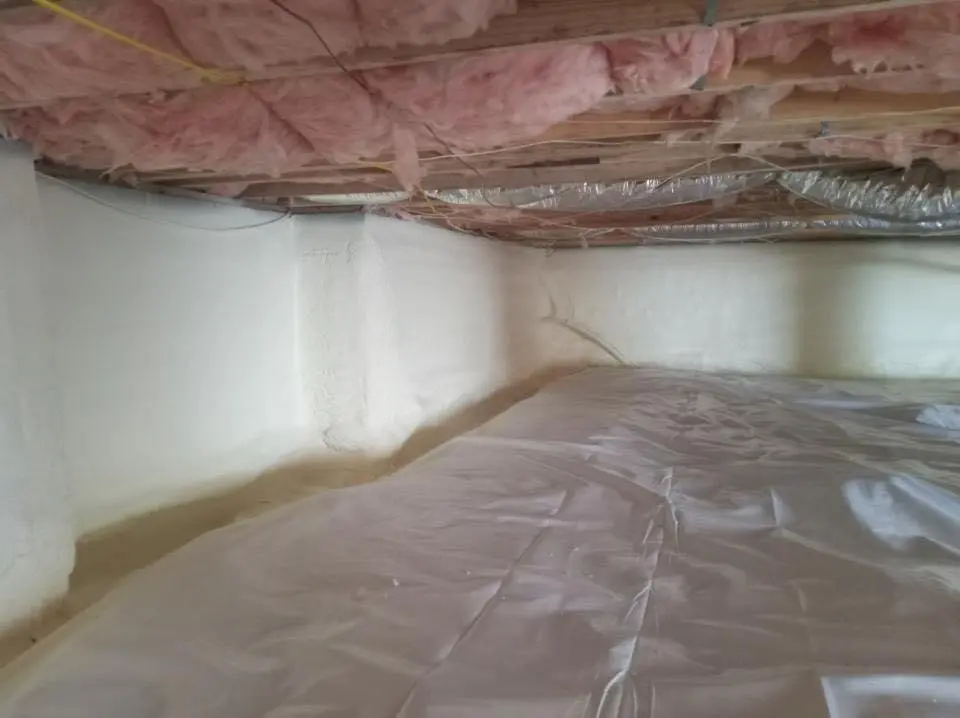 Crawl space encapsulation with closed-cell spray foam for Commercial Roof Restoration in Tell City